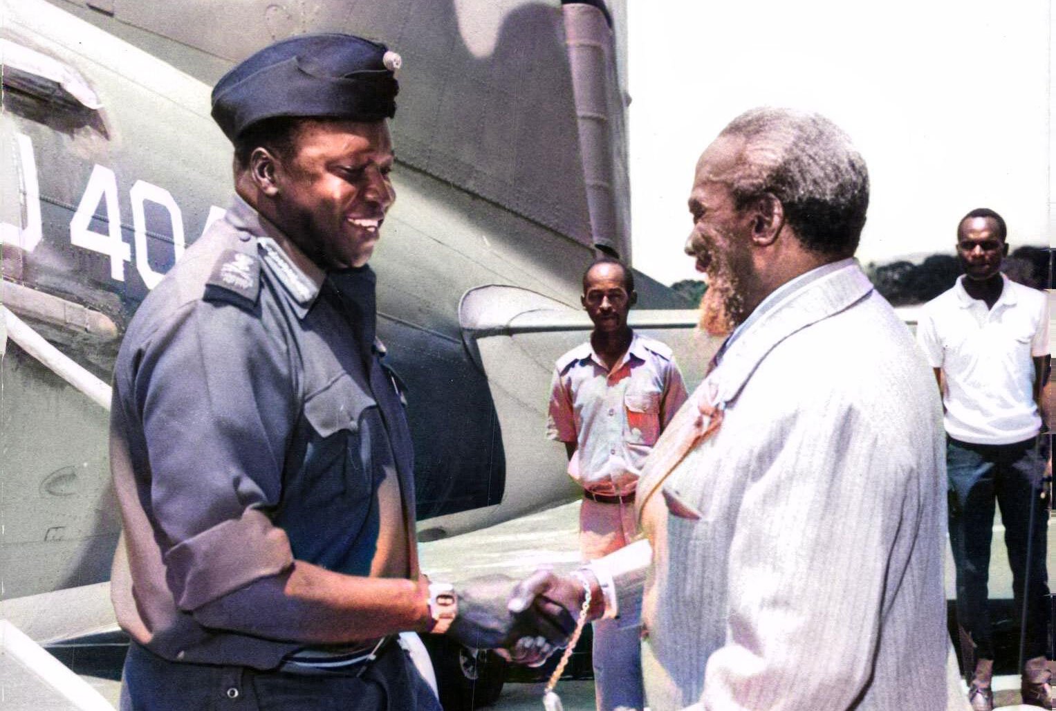 Uganda President Idi Amin is welcomed by President Jomo Kenyatta.